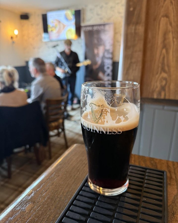 A pint on the bar during live music